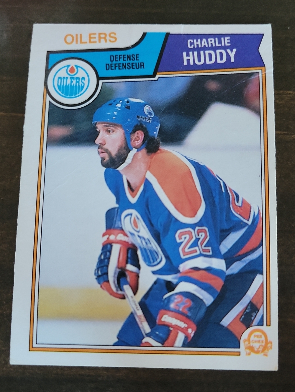 1983/84 OPC Charlie Huddy Oilers Hockey Card - Blue & Orange
